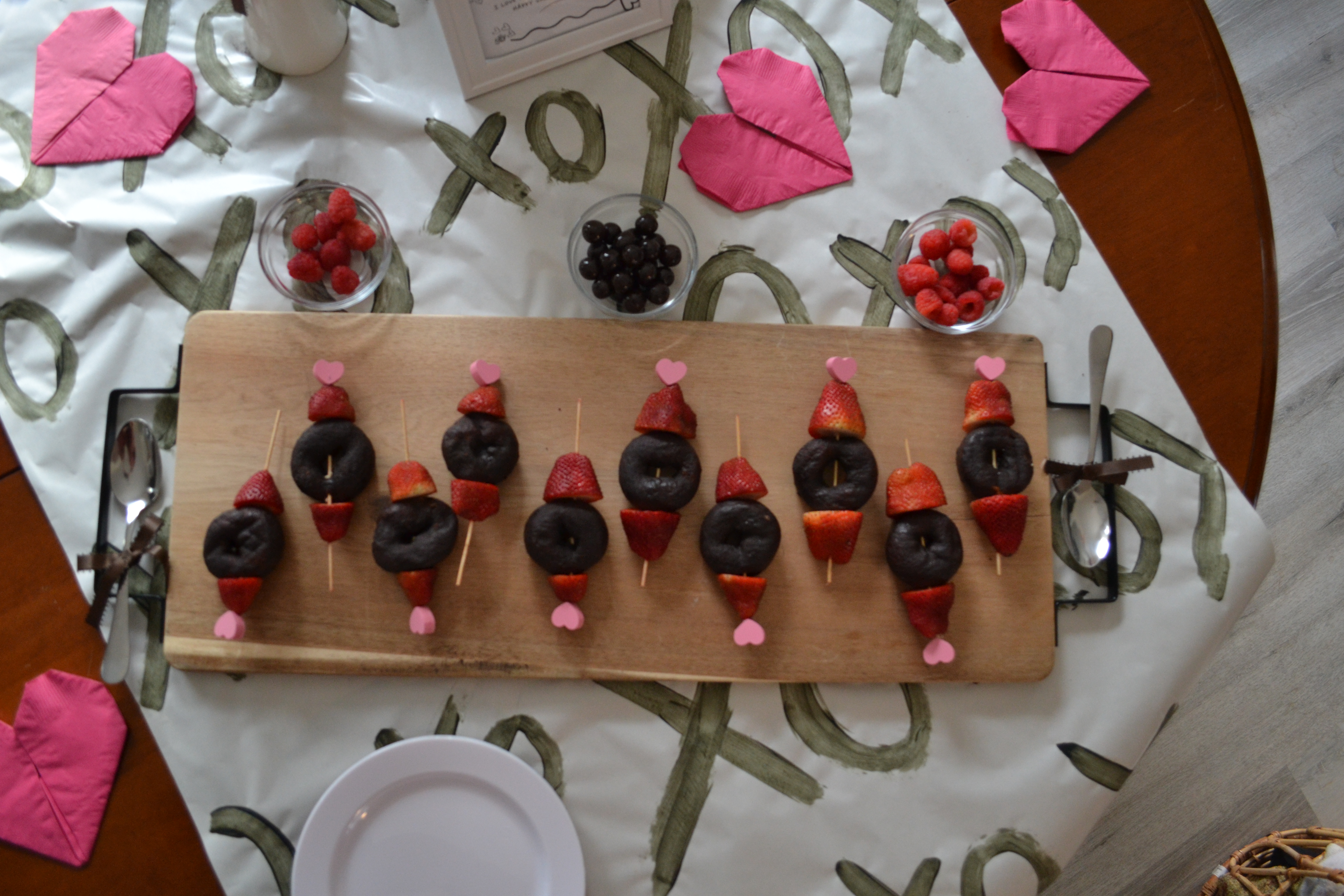 heart skewers with strawberries and chocolate donuts