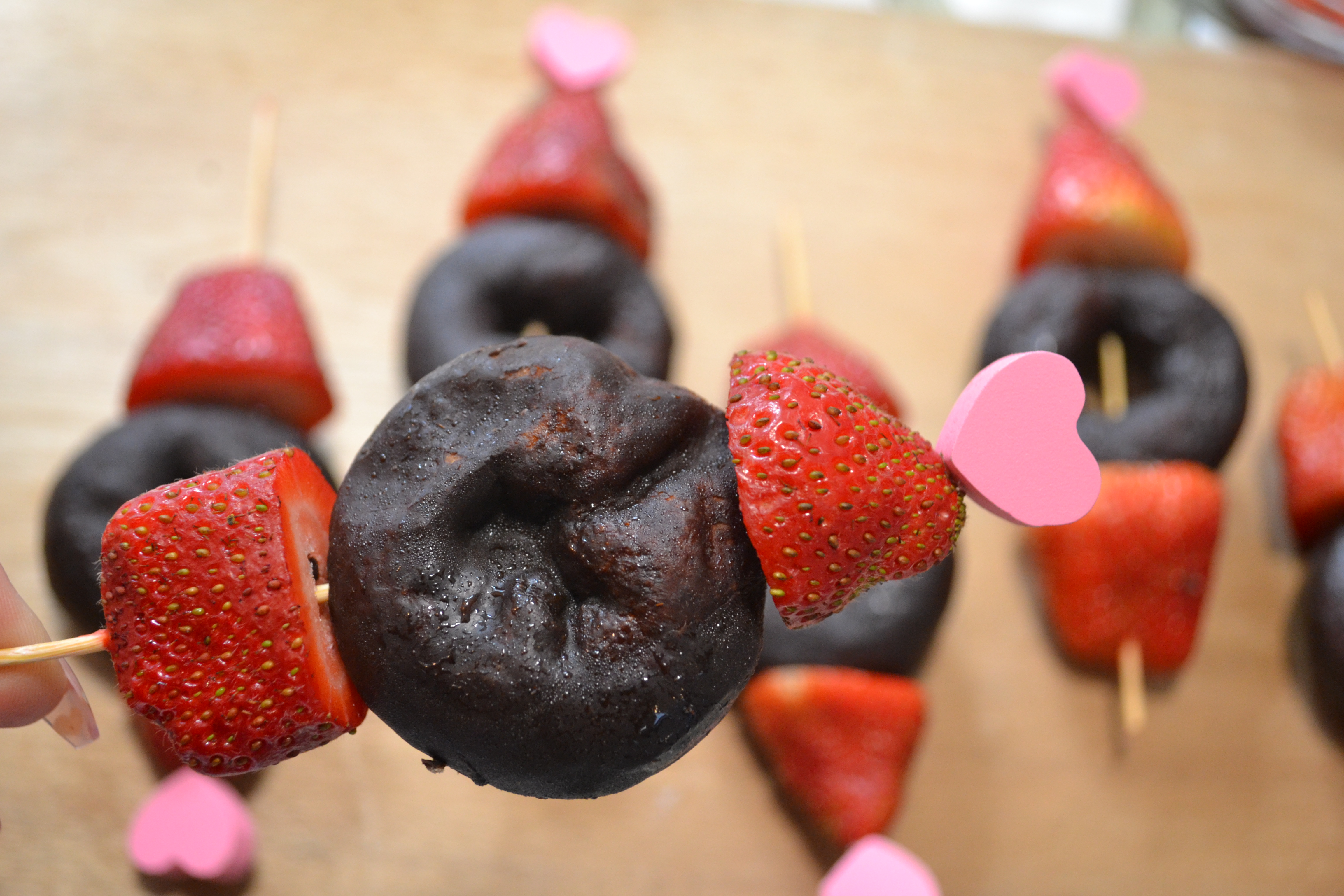 heart skewers with strawberries and chocolate donuts