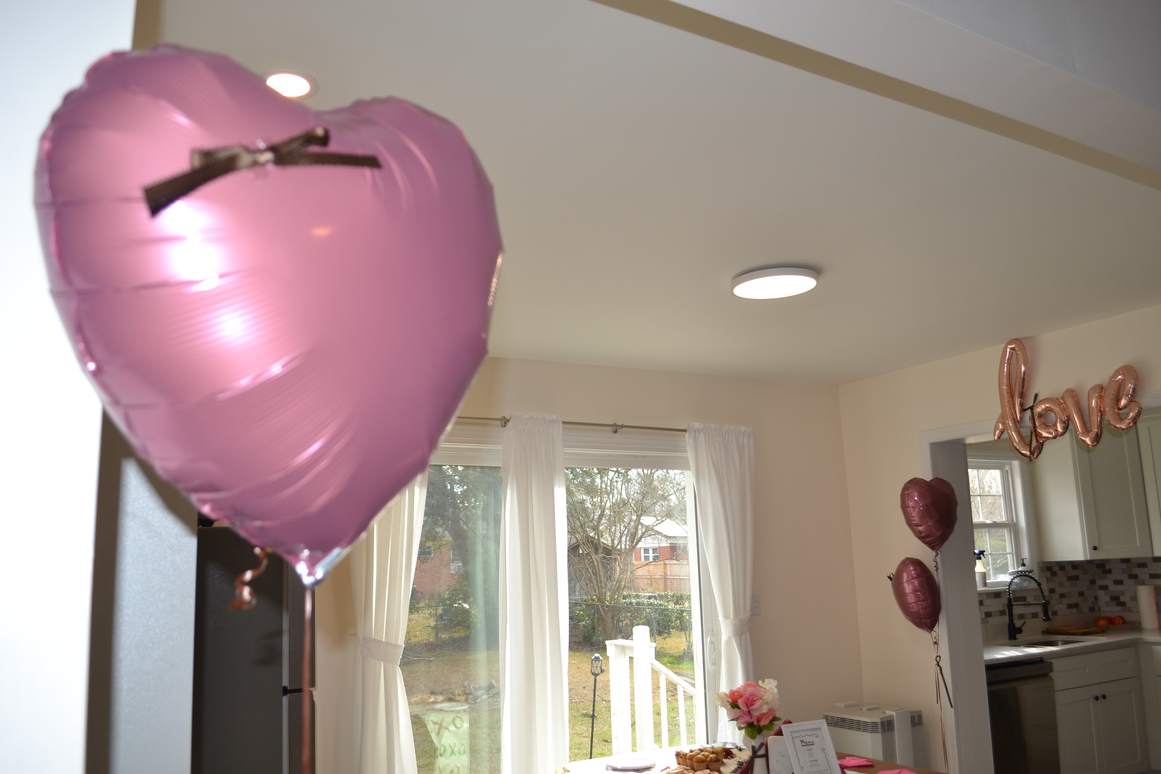 heart balloons and valentine's day table setup