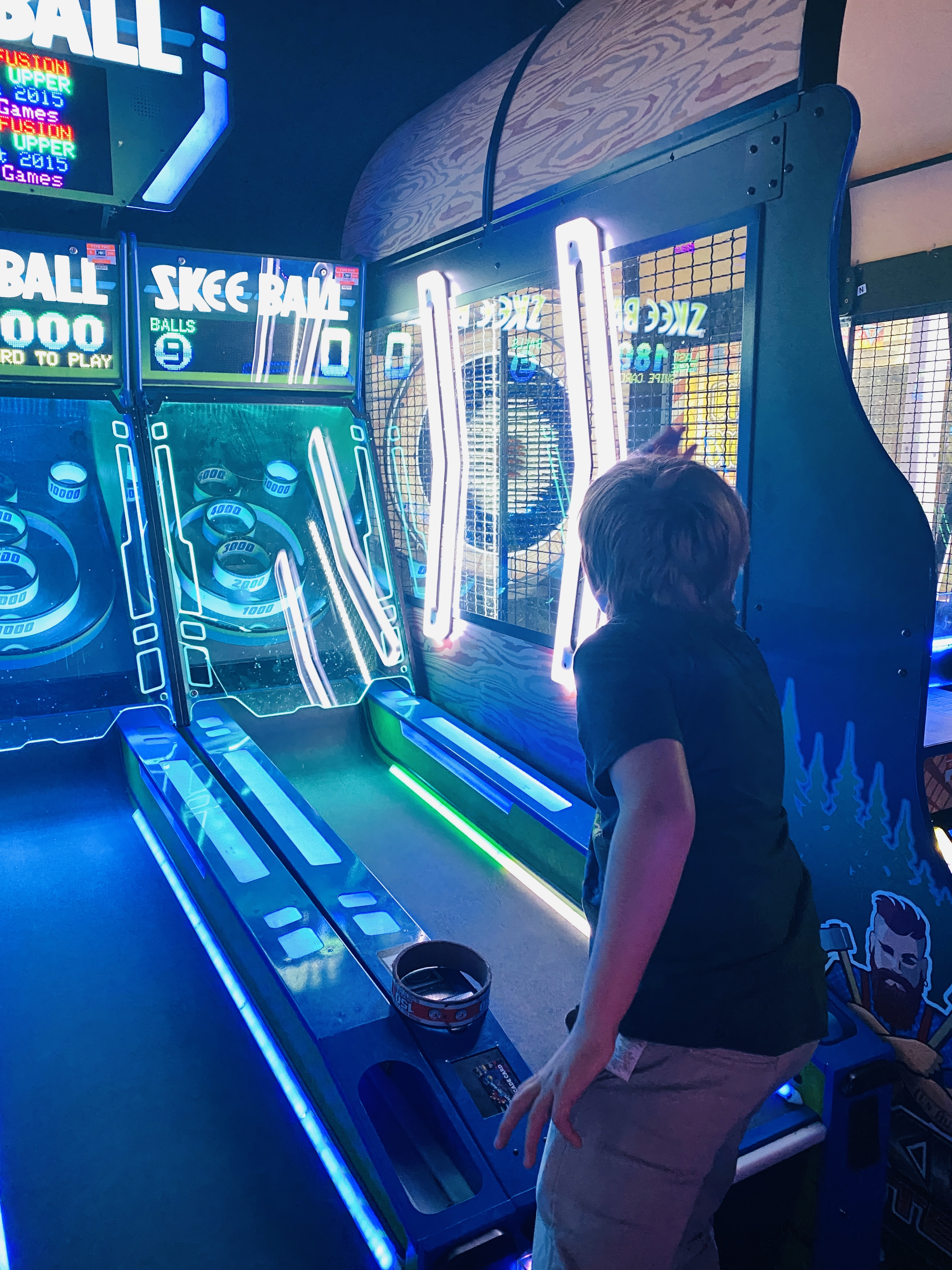 Nephew Throwing a Ski Ball