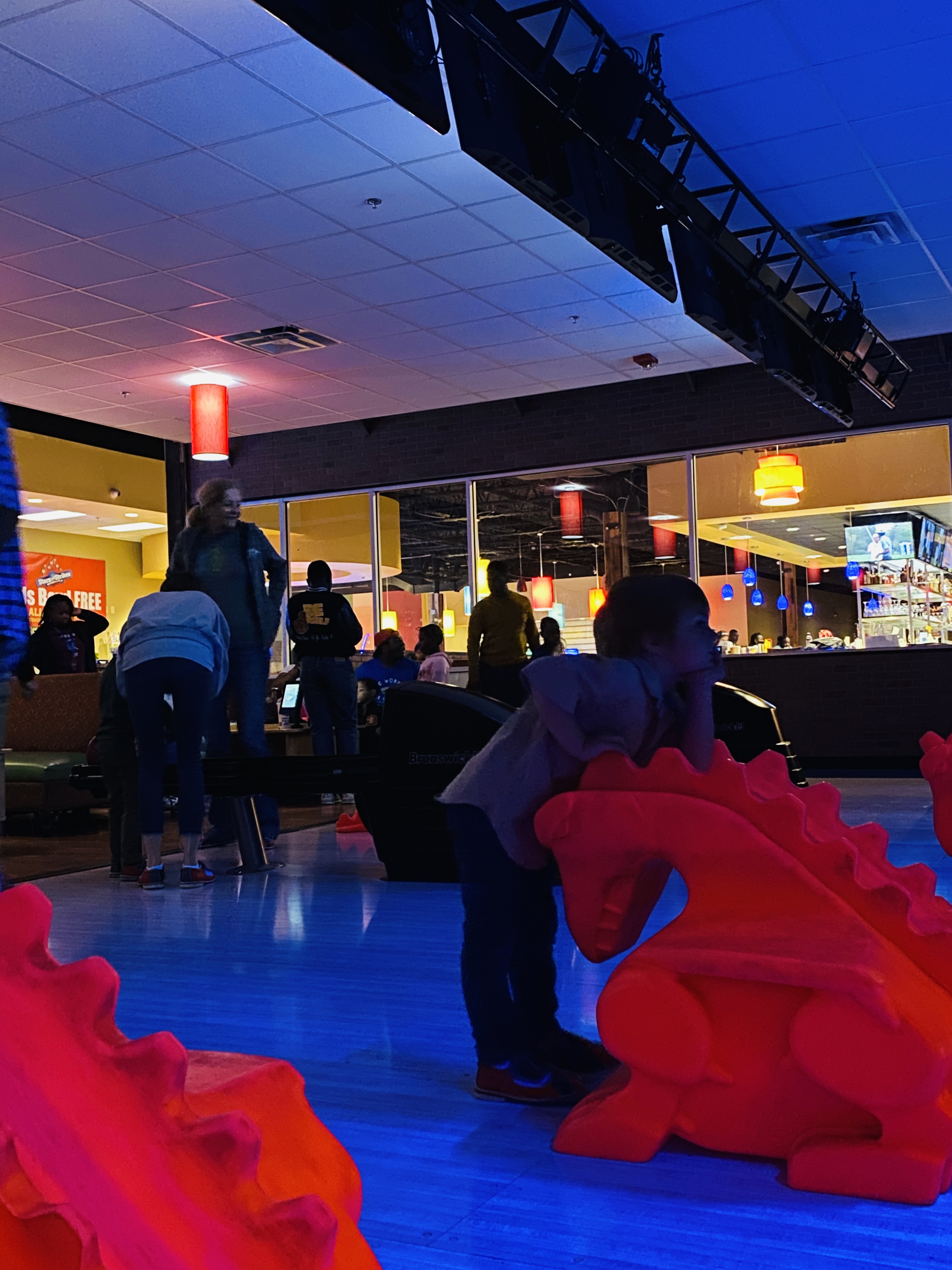 Nephew Leaning on Bowling Slide