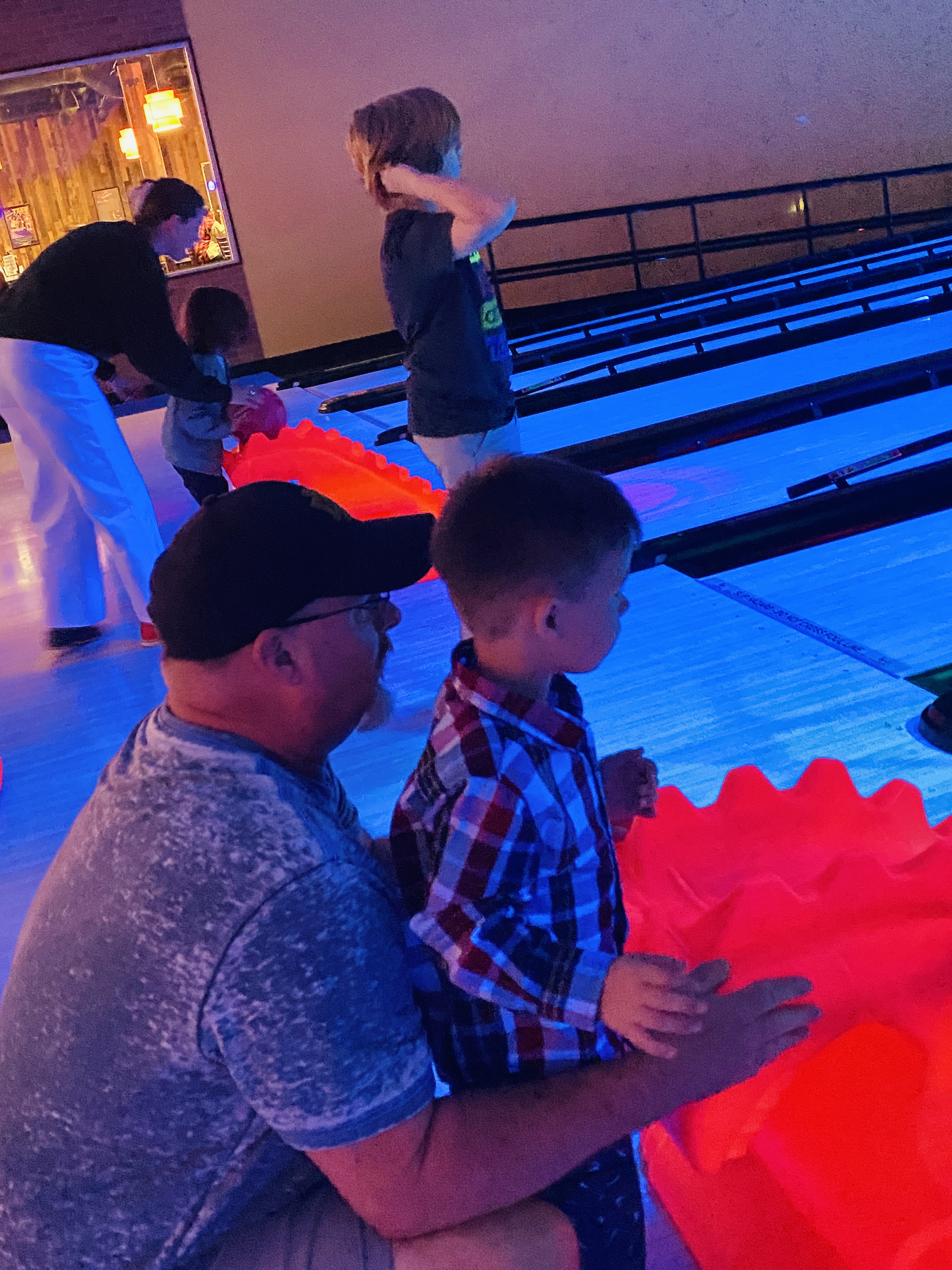 Pop Pop and Grandson Bowling